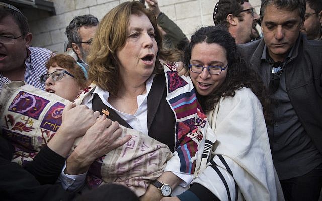 Orthodox Jews try to prevent a group of American Conservative and Reform rabbis and the Women of the Wall movement members from bringing Torah scrolls into the Western Wall compound during a protest march against the government’s failure to deliver a new prayer space, at the Western Wall in Jerusalem Old City, November 2, 2016. (Hadas Parush/Flash90) Orthodox Jews try to prevent a group of American Conservative and Reform rabbis and the Women of the Wall movement members from bringing Torah scrolls into the Western Wall compound during a protest march against the government’s failure to deliver a new prayer space, at the Western Wall in Jerusalem Old City, November 2, 2016. (Hadas Parush/Flash90)