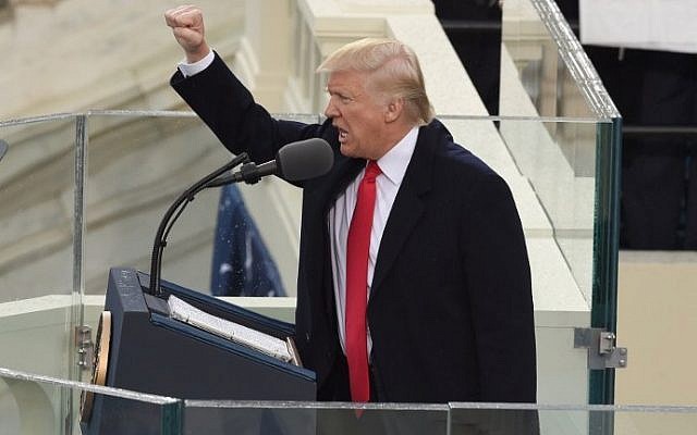 US President Donald Trump salutes the crowd after the swearing-in ceremony as 45th President of the USA in front of the Capitol in Washington on January 20, 2017. (AFP Photo/Timothy A. Clary)