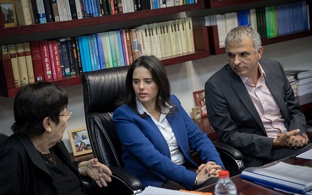 Miriam Naor, left, Ayelet Shaked, center, and Moshe Kahlon discussing Supreme Court candidates on February 22, 2017. (Yonatan Sindel/Flash 90) Miriam Naor, left, Ayelet Shaked, center, and Moshe Kahlon discussing Supreme Court candidates on February 22, 2017. (Yonatan Sindel/Flash 90)