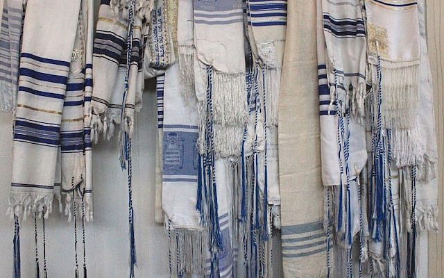 A rack of prayer shawls at Congregation B’nai Israel shows the unique style of tzitzit used by Karaite Jews. (David A.M. Wilensky) A rack of prayer shawls at Congregation B’nai Israel shows the unique style of tzitzit used by Karaite Jews. (David A.M. Wilensky)