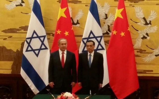 China's Premier Li Keqiang and  Prime Minister Benjamin Netanyahu attend a signing ceremony at the Great Hall of the People in Beijing on March 20, 2017 (Raphael Ahren / Times of Israel)