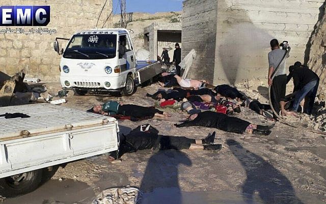 This photo provided Tuesday, April 4, 2017 by the Syrian anti-government activist group Edlib Media Center, which has been authenticated based on its contents and other AP reporting, shows victims of a suspected chemical attack, in the town of Khan Sheikhoun, northern Idlib province, Syria. (Edlib Media Center, via AP) This photo provided Tuesday, April 4, 2017 by the Syrian anti-government activist group Edlib Media Center, which has been authenticated based on its contents and other AP reporting, shows victims of a suspected chemical attack, in the town of Khan Sheikhoun, northern Idlib province, Syria. (Edlib Media Center, via AP)