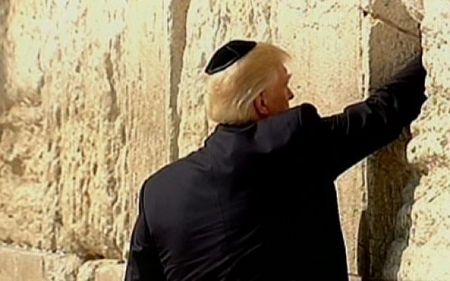 Donald Trump placing a note in the Western Wall in the Old City of Jerusalem on May 22, 2017. (screen capture: Channel 2) Donald Trump placing a note in the Western Wall in the Old City of Jerusalem on May 22, 2017. (screen capture: Channel 2)