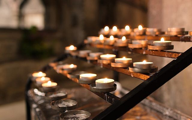 Tealight candles in a church lit for prayer and remembrance. (iStock) Tealight candles in a church lit for prayer and remembrance. (iStock)
