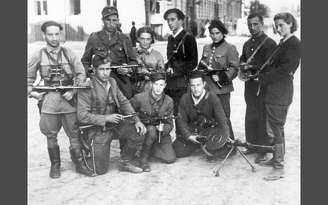 Abba Kovner (back row, center) with members of the Fareynikte Partizaner Organizatsye (The FPO – Eng: United Partisan Organization) in Vilna, 1940s (Courtesy Israel National Library)