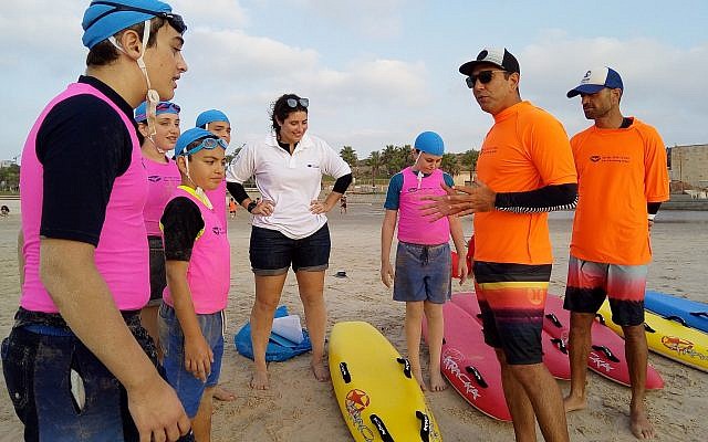 Trained instructors motivate young Nippers to try out new surf and beach skills