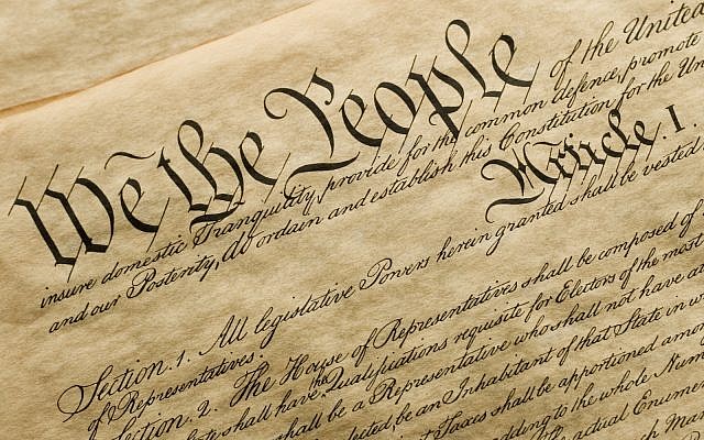 Copy of the cover of the US Constitution (via iStock)