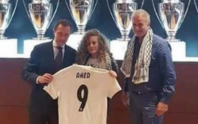 Palestinian activist, who spent eight months in Israeli prison, is welcomed at Bernabeu stadium by the football club.