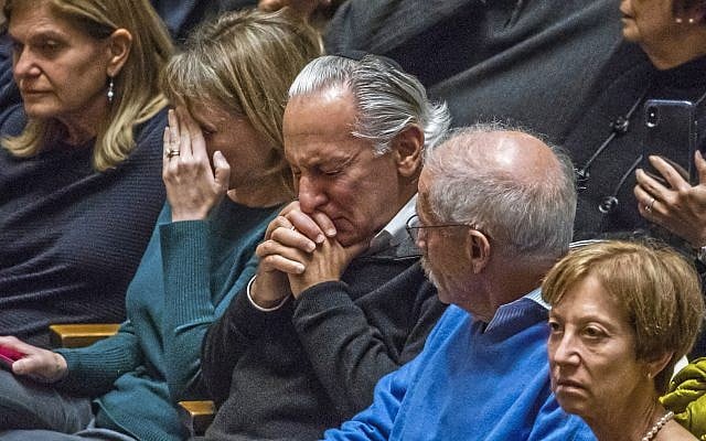 People gather at Soldiers & Sailors Memorial Hall for a vigil to remember the victims of the mass shooting a day earlier at the Tree of Life Synagogue, Sunday, Oct. 28, 2018, in Pittsburgh. (Andrew Rush/Pittsburgh Post-Gazette via AP - via Jewish News) People gather at Soldiers & Sailors Memorial Hall for a vigil to remember the victims of the mass shooting a day earlier at the Tree of Life Synagogue, Sunday, Oct. 28, 2018, in Pittsburgh. (Andrew Rush/Pittsburgh Post-Gazette via AP - via Jewish News)