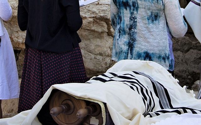 A Torah scroll at a prayer service at the Robinson's arch area of the Western Wall. Photo credit: Laura Ben-David A Torah scroll at a prayer service at the Robinson's arch area of the Western Wall. Photo credit: Laura Ben-David