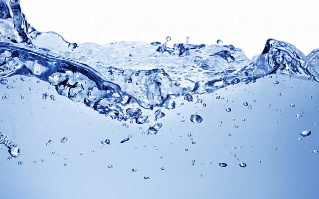 Water and air bubbles over white background with space for text