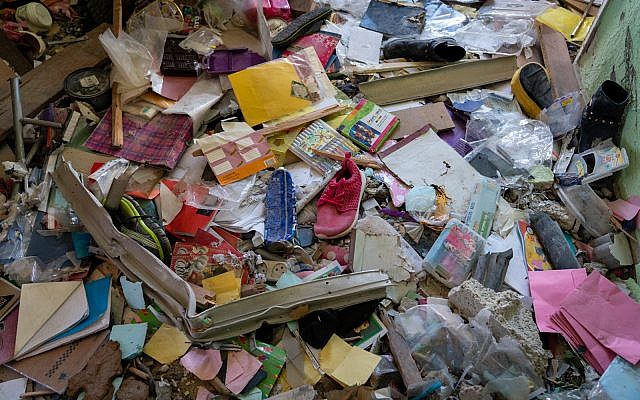 Debris on the floor of an apartment destroyed by a Hamas rocket in Ashkelon, November 13, 2018. (Luke Tress/Times of Israel)