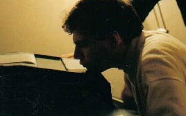 The columnist as a young man, bravely reporting on Romania via telex in 1990. (courtesy)