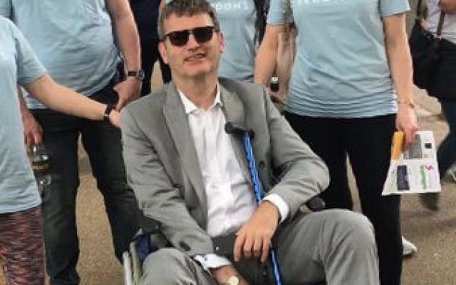 Mark Lewis during this the 2018 Al-Quds Day parade, which he temporarily halted in his wheelchair (Jewish News) Mark Lewis during this the 2018 Al-Quds Day parade, which he temporarily halted in his wheelchair (Jewish News)