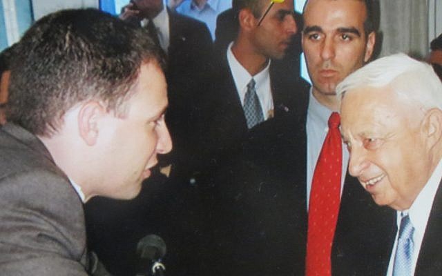 The columnist (left) with General (and PM) Ariel Sharon in 2002.
