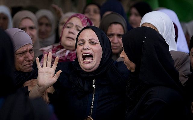 Relatives of Aisha Rabi mourn at the family home during her funeral in the West Bank village of Biddya, October 13, 2018. (AP Photo/ Majdi Mohammed) Relatives of Aisha Rabi mourn at the family home during her funeral in the West Bank village of Biddya, October 13, 2018. (AP Photo/ Majdi Mohammed)