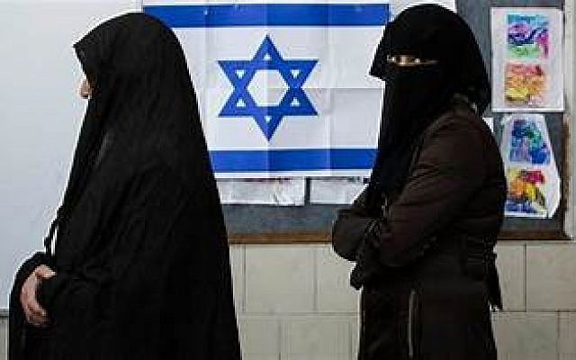 Waiting their turn at an Israeli polling station.