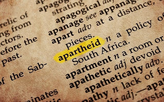 Apartheid word in old textured dictionary (Shutterstock).