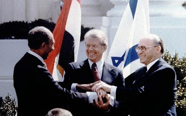 Anwar Sadat, Jimmy Carter and Menahem Begin sign Israel-Egypt Peace Treaty on the White House Lawn, March 26, 1979