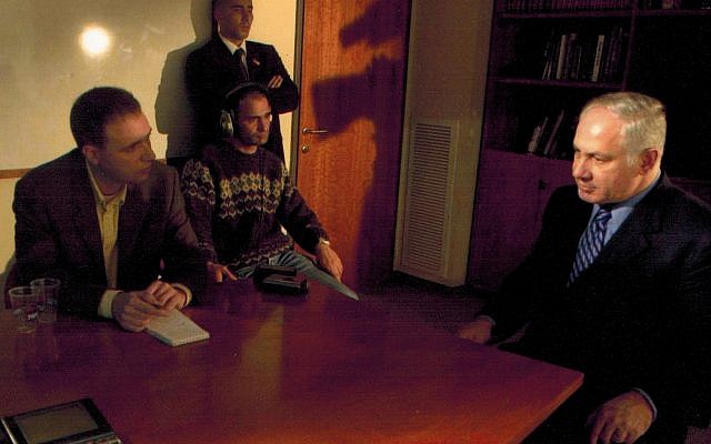 Somewhat younger Netanyahu enjoys an interview with the author