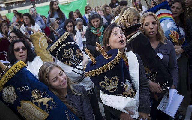 Women of the Wall, together with a group of American Conservative and Reform rabbis, hold Torah scrolls during a protest march against the government’s failure to deliver a new prayer space at the Western Wall,, November 2, 2016. (Hadas Parush/Flash90) Women of the Wall, together with a group of American Conservative and Reform rabbis, hold Torah scrolls during a protest march against the government’s failure to deliver a new prayer space at the Western Wall,, November 2, 2016. (Hadas Parush/Flash90)
