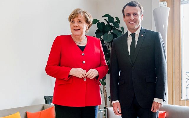 French President Emmanuel Macron and German Chancellor Angela Merkel meet on the sidelines of an EU summit in Brussels, Belgium March 21, 2019. Geert Vanden Wijngaert/Pool via Reuters
