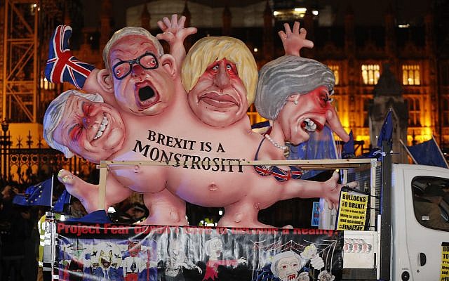 An anti-Brexit effigy is driven around Parliament square after the results of the vote on British Prime Minister Theresa May's Brexit deal were announced in London, Tuesday, Jan. 15, 2019. AP Photo/Frank Augstein) An anti-Brexit effigy is driven around Parliament square after the results of the vote on British Prime Minister Theresa May's Brexit deal were announced in London, Tuesday, Jan. 15, 2019. AP Photo/Frank Augstein)