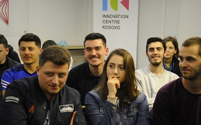 Young people listen to a lecture by visiting American Jewish public relations executive Ari Zoldan at the Innovation Center Kosovo (ICK) in Prishtinë. (Larry Luxner)
