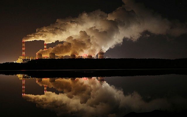 Plumes of smoke rise from Europe's largest lignite power plant in Belchatow, central Poland, November 28, 2018. Fossil fuels are now heating the earth faster than scientists had expected even a few years ago. (AP Photo/Czarek Sokolowski)