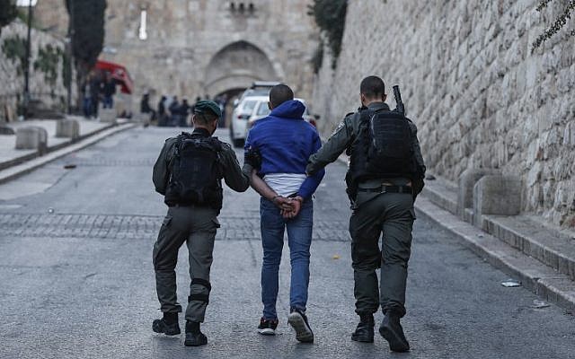 Israeli policemen detain a Palestinian outside the Old City of Jerusalem after Israeli forces closed the entrance to al-Aqsa mosque compound on March 12, 2019. (Photo by Ahmad GHARABLI / AFP)Police officers detain a Palestinian man outside the Old City of Jerusalem on March 12, 2019. (Ahmad Gharabli/AFP) Israeli policemen detain a Palestinian outside the Old City of Jerusalem after Israeli forces closed the entrance to al-Aqsa mosque compound on March 12, 2019. (Photo by Ahmad GHARABLI / AFP)Police officers detain a Palestinian man outside the Old City of Jerusalem on March 12, 2019. (Ahmad Gharabli/AFP)