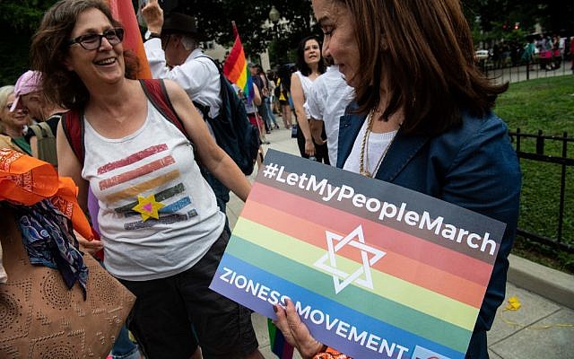 Lesbian activits take part in the Dyke March in Washington, DC, on June 7, 2019. (Photo by NICHOLAS KAMM / AFP)