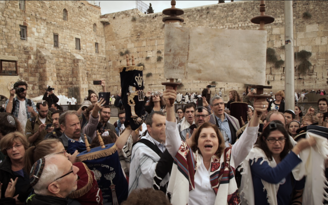 Anat Hoffman, director of Women of the Wall, holds a Torah scroll at the Western Wall, November 2, 2016. (Luke Tress/Times of Israel) Anat Hoffman, director of Women of the Wall, holds a Torah scroll at the Western Wall, November 2, 2016. (Luke Tress/Times of Israel)