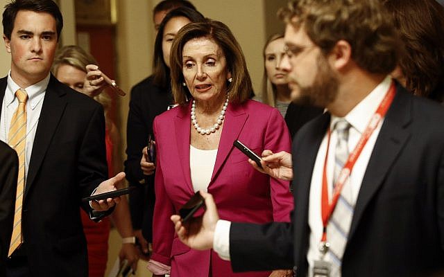 US House Speaker Nancy Pelosi walks to the House Chamber, July 16, 2019, on Capitol Hill in Washington. (AP Photo/Patrick Semansky)
