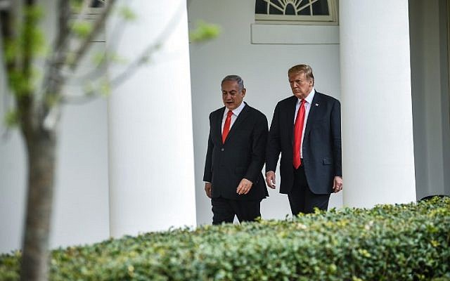 US President Donald Trump (R) and Prime Minister Benjamin Netanyahu talk while walking to the West Wing of the White House for a meeting, March 25, 2019. (Brendan Smialowski/AFP) US President Donald Trump (R) and Prime Minister Benjamin Netanyahu talk while walking to the West Wing of the White House for a meeting, March 25, 2019. (Brendan Smialowski/AFP)