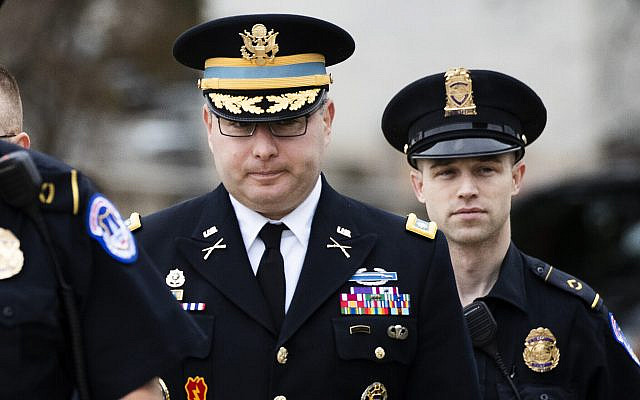 Army Lieutenant Colonel Alexander Vindman, a military officer at the National Security Council, center, arrives on Capitol Hill in Washington, October 29, 2019. (AP /Manuel Balce Ceneta) Army Lieutenant Colonel Alexander Vindman, a military officer at the National Security Council, center, arrives on Capitol Hill in Washington, October 29, 2019. (AP /Manuel Balce Ceneta)