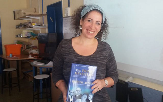 In the classroom, with 'The Prime Ministers,' one of the books I edited. (courtesy)