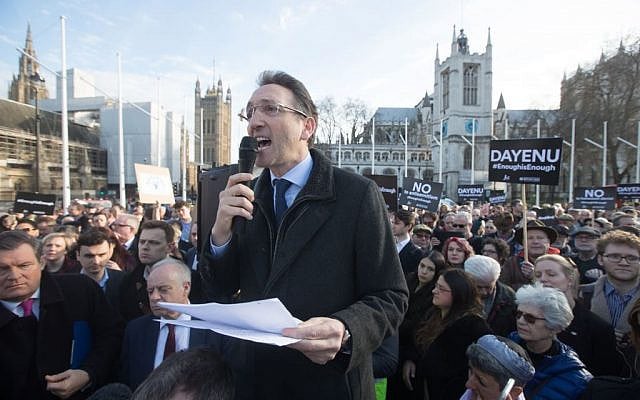 Jonathan Goldstein addresses the large crowd in Parliament Square at the #EnoughIsEnough demo

(Credit Marc Morris via Jewish News)