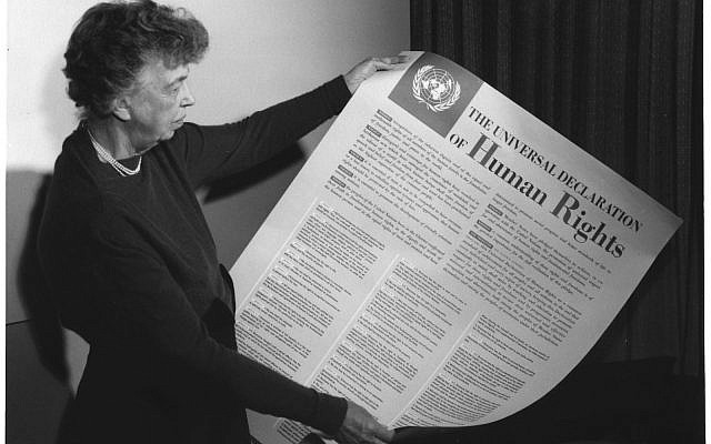 Eleanor Roosevelt holding poster of the Universal Declaration of Human Rights (in English), Lake Success, New York. November 1949. Eleanor Roosevelt holding poster of the Universal Declaration of Human Rights (in English), Lake Success, New York. November 1949.