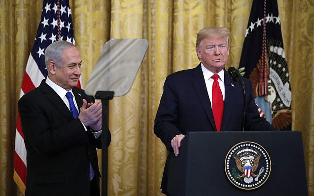 President Donald Trump pauses as he announces a deal for Israeli-Palestinian peace with Prime Minister Benjamin Netanyahu in the East Room of the White House, January 28, 2020, in Washington. (AP Photo/Alex Brandon) President Donald Trump pauses as he announces a deal for Israeli-Palestinian peace with Prime Minister Benjamin Netanyahu in the East Room of the White House, January 28, 2020, in Washington. (AP Photo/Alex Brandon)