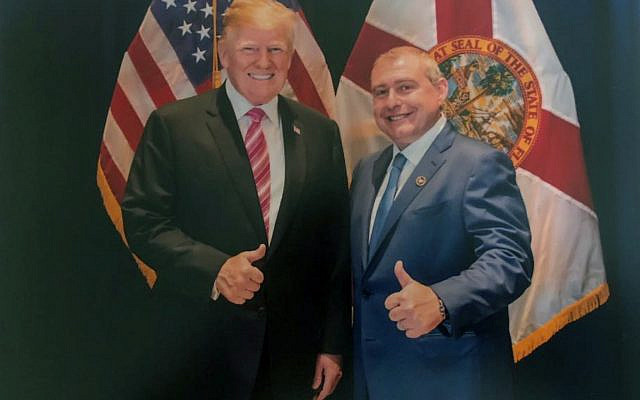 This undated image, released by the US House Judiciary Committee from documents provided by Lev Parnas to the committee in the impeachment probe against US President Donald Trump, shows a photo of Lev Parnas with Trump in Florida. Parnas, a close associate of Trump's personal lawyer Rudy Giuliani is claiming Trump was directly involved in the effort to pressure Ukraine to investigate Democratic rival Joe Biden. Trump on January 16, 2020, repeated denials that he is acquainted with Parnas, despite numerous photos of the two men together. (House Judiciary Committee via AP)