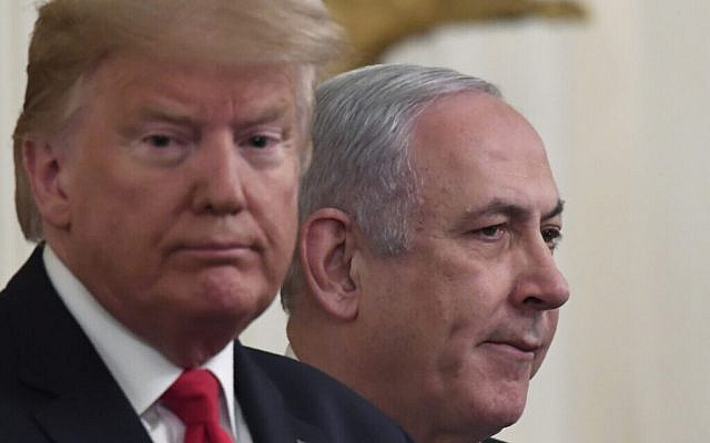 US President Donald Trump and Prime Minister Benjamin Netanyahu, during an event in the East Room of the White House in Washington, January 28, 2020, to announce the Trump administration's much-anticipated plan to resolve the Israeli-Palestinian conflict. (AP Photo/Susan Walsh) US President Donald Trump and Prime Minister Benjamin Netanyahu, during an event in the East Room of the White House in Washington, January 28, 2020, to announce the Trump administration's much-anticipated plan to resolve the Israeli-Palestinian conflict. (AP Photo/Susan Walsh)