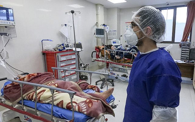 A nurse cares for patients in a ward dedicated for people infected with the coronavirus, at Forqani Hospital in Qom, Iran, February 26, 2020. (Mohammad Mohsenzadeh/Mizan News Agency via AP ) A nurse cares for patients in a ward dedicated for people infected with the coronavirus, at Forqani Hospital in Qom, Iran, February 26, 2020. (Mohammad Mohsenzadeh/Mizan News Agency via AP )