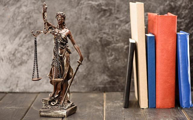 Illustrative. Lady Justice and the books of law. (iStock)
