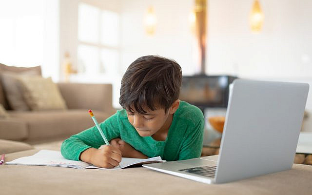 Illustrative. A boy's studies via laptop. (iStock)
