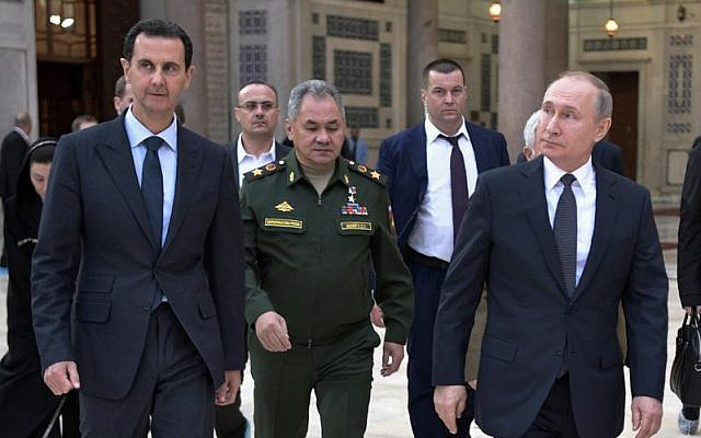 Putin, Assad and Russian defense minister Shoigu, during Putin's last visit to Damascus (Jan 7, 2020) (ALEXEI NIKOLSKY / SPUTNIK, KREMLIN POOL PHOTO VIA AP)