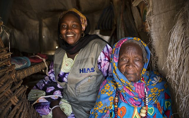 Chad/ Darfuri Refugees / Mariam Khamis Hawid, an elderly woman, receives psychosocial support from HIAS at Djabal refugee camp in Goz Beida, eastern Chad. HIAS provides psycho social support and other services for the elderly at refugee camps throughout Chad, November 6, 2013.(Glenna Gordon)