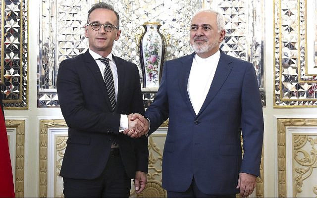 Iranian Foreign Minister Mohammad Javad Zarif, right, and his German counterpart Heiko Maas shake hands for media prior to their meeting, in Tehran, Iran, June 10, 2019. (AP Photo/Ebrahim Noroozi) Iranian Foreign Minister Mohammad Javad Zarif, right, and his German counterpart Heiko Maas shake hands for media prior to their meeting, in Tehran, Iran, June 10, 2019. (AP Photo/Ebrahim Noroozi)