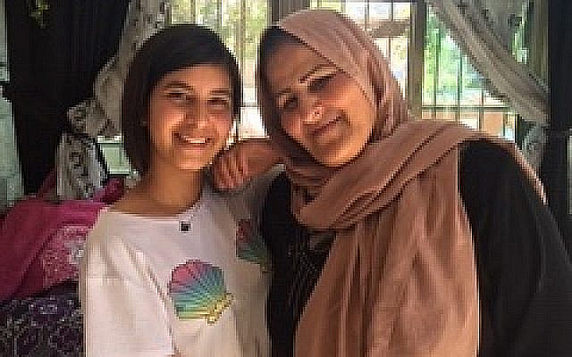 Amal Sumarin and her granddaughter Diana.