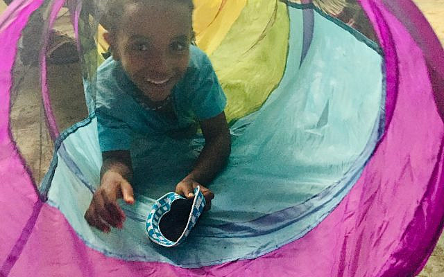"Going Up to Jerusalem" Mosei emerges from the play tunnel. Gondar Ethiopia, July 2019. Photos by Neal Brodsky LMFT