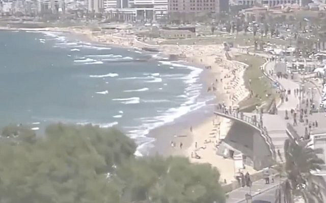 Israelis at the beach in Tel Aviv on May 8, 2020. (Screen capture: Twitter)